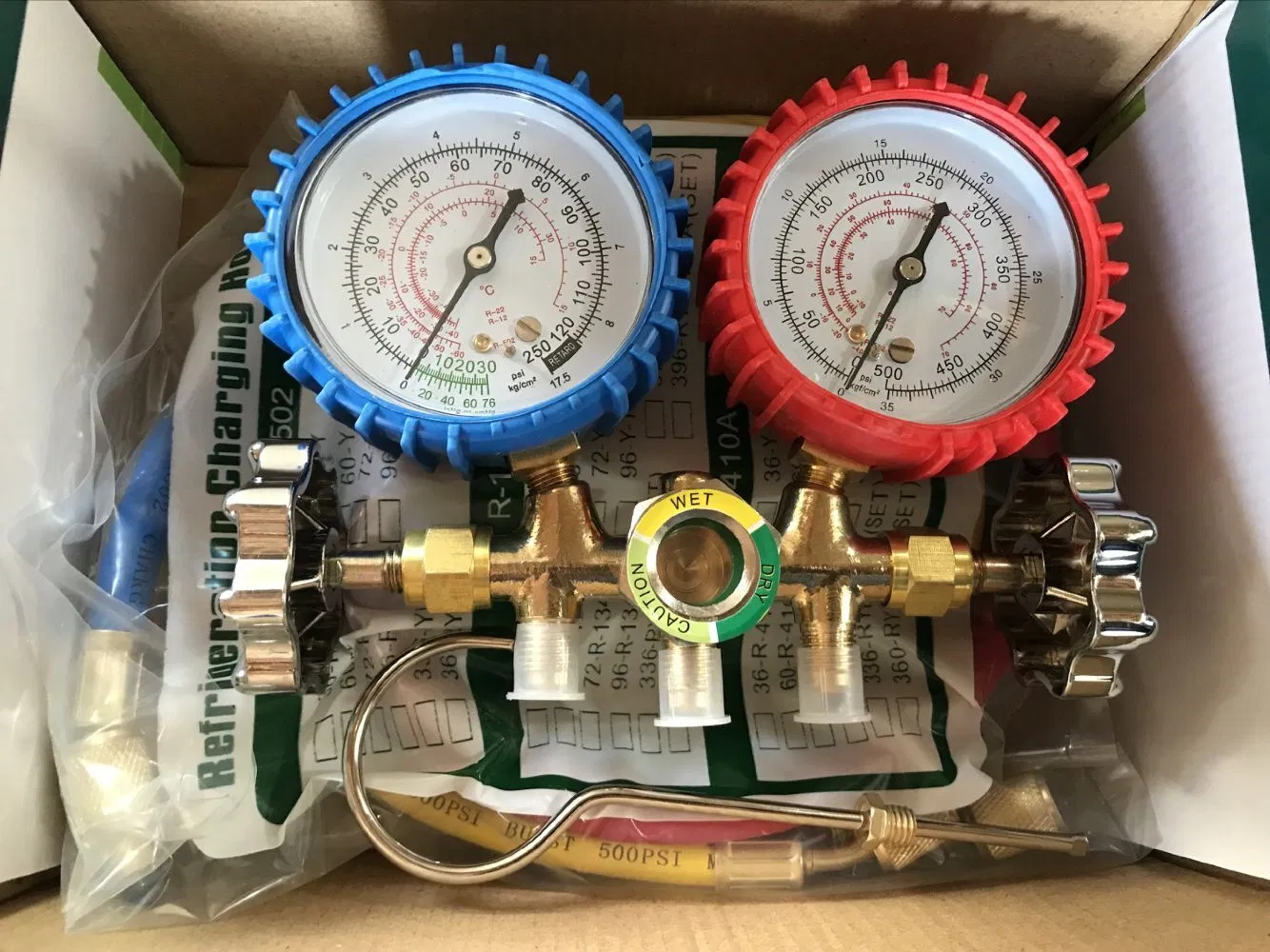 R134a manifold gauge used for automotive AC servicing, refrigeration pressure testing, refrigerant charging, and HVAC maintenance supplied by System Star Industrial in East Africa