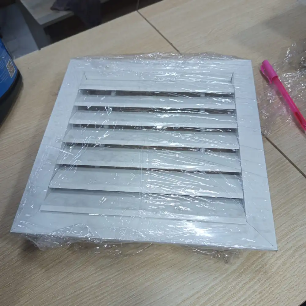 Double deflection grille with adjustable horizontal and vertical blades used for HVAC air distribution and airflow control in commercial buildings, hotels, hospitals, and offices in Kenya, Uganda, and Tanzania supplied by System Star Industrial.